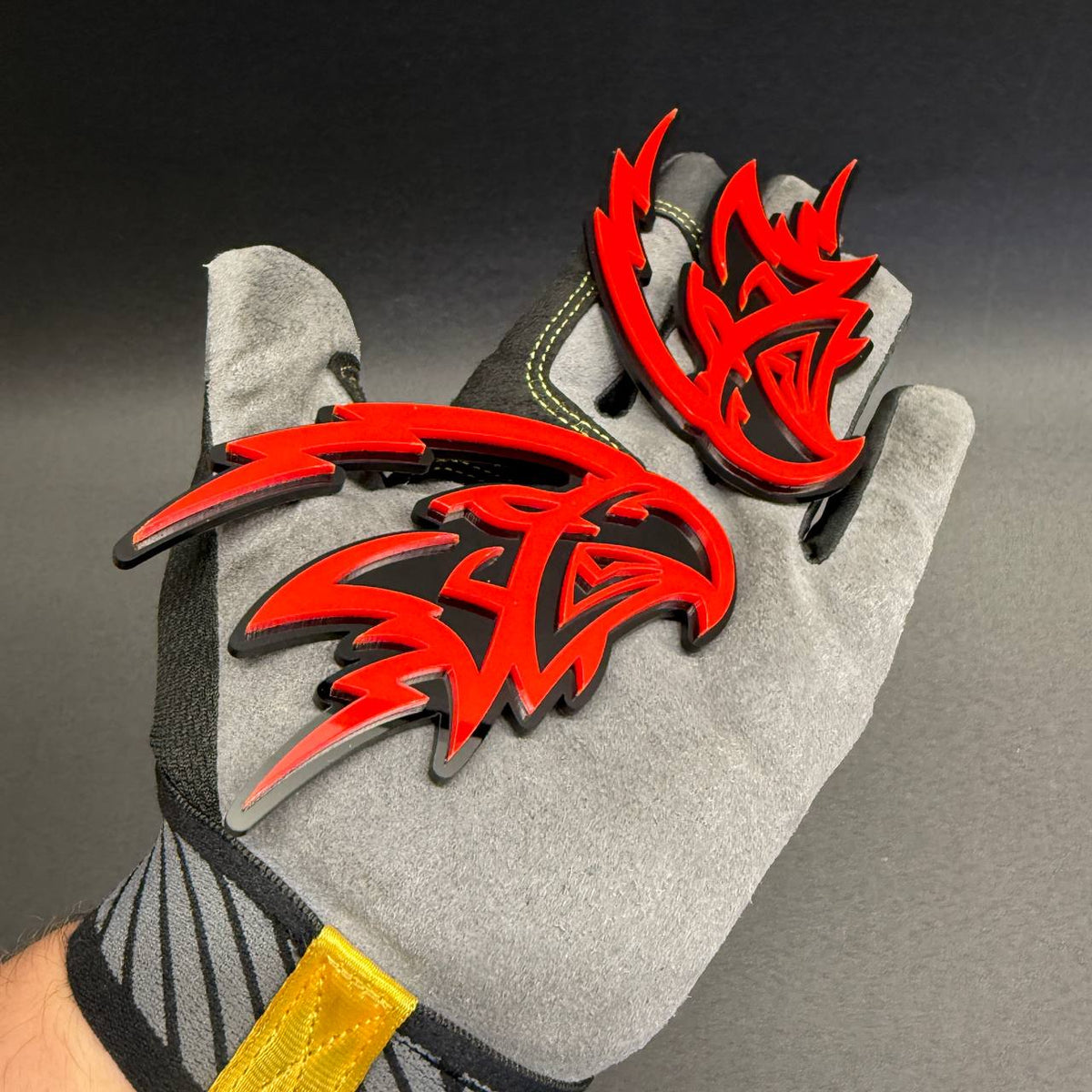 Angry Falcon aftermarket grille and tailgate emblem featuring a fierce bird graphic for Jeep, GMC, Toyota, Nissan and pickup truck accessories.