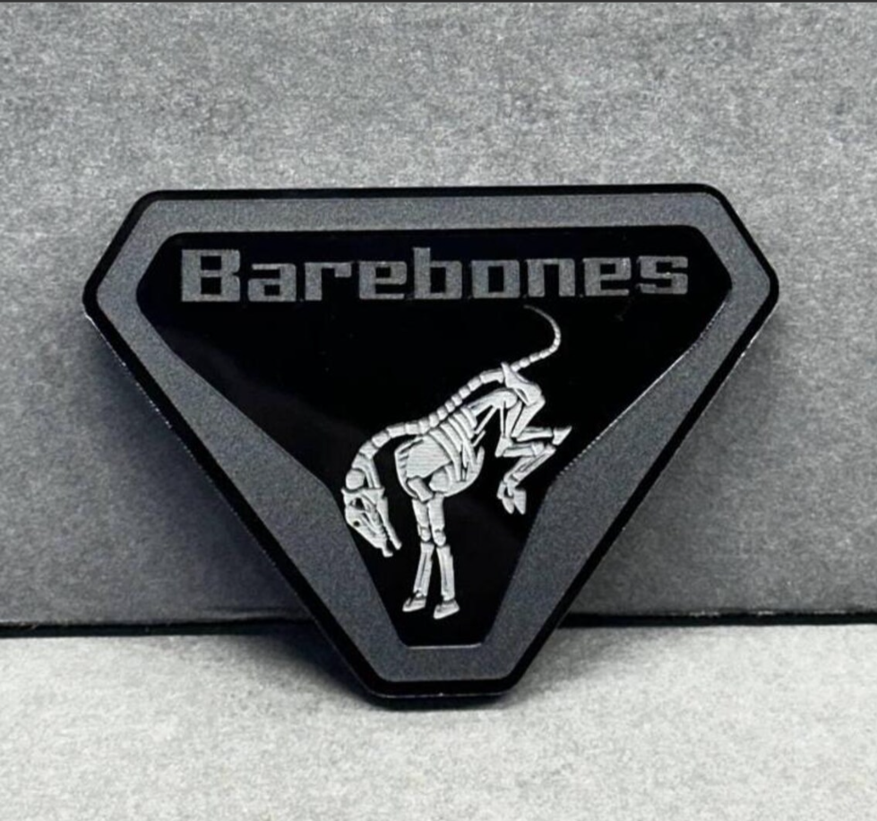 Barebones skeleton emblem installed on Ford Bronco grille or tailgate custom badge