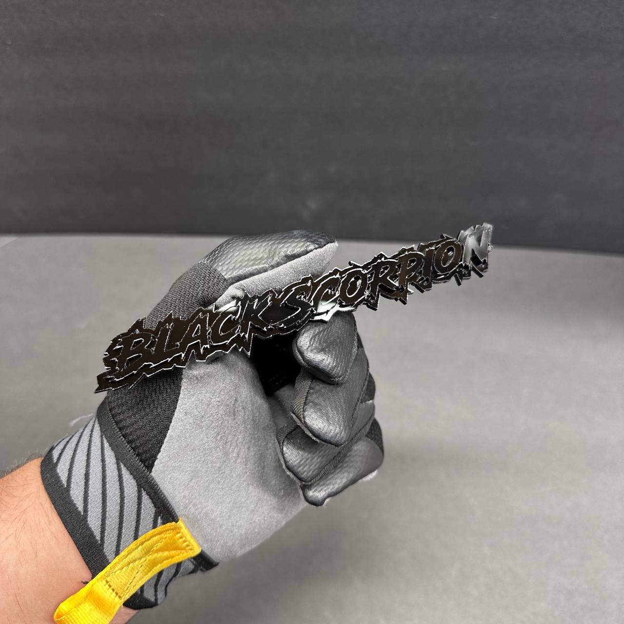 Custom Black Scorpion text badge in layered acrylic for vehicle fender and tailgate styling