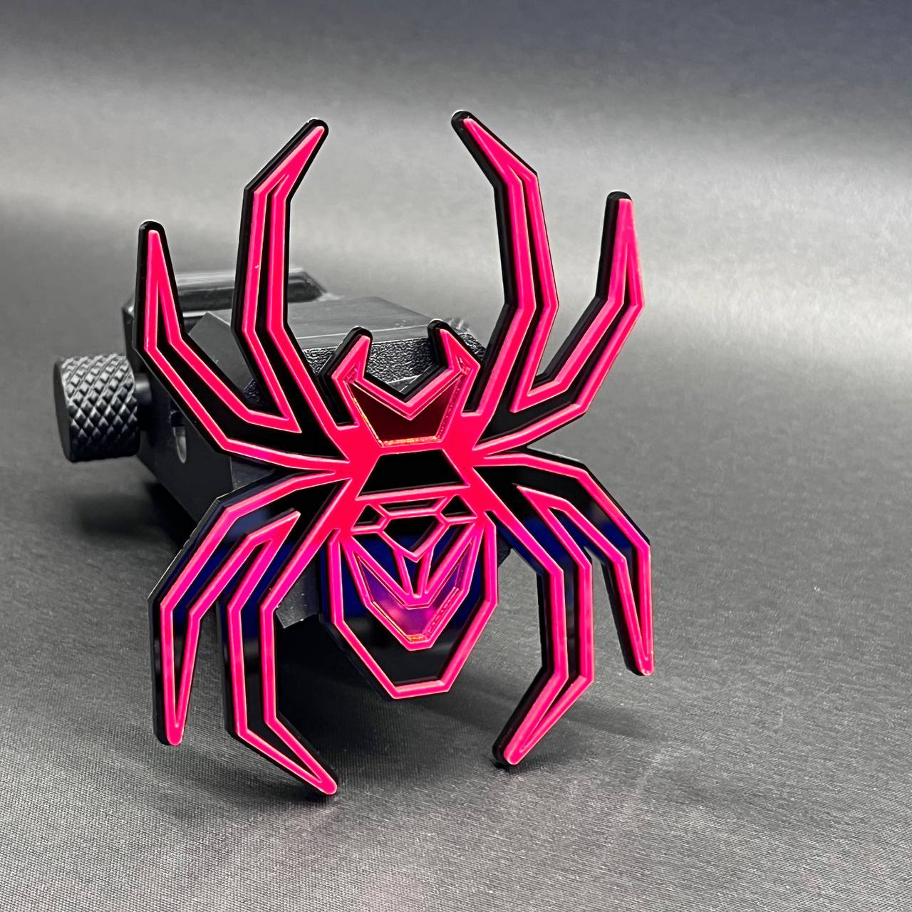 Custom Black Widow mirror finish hitch cover emblem for trucks and SUVs.