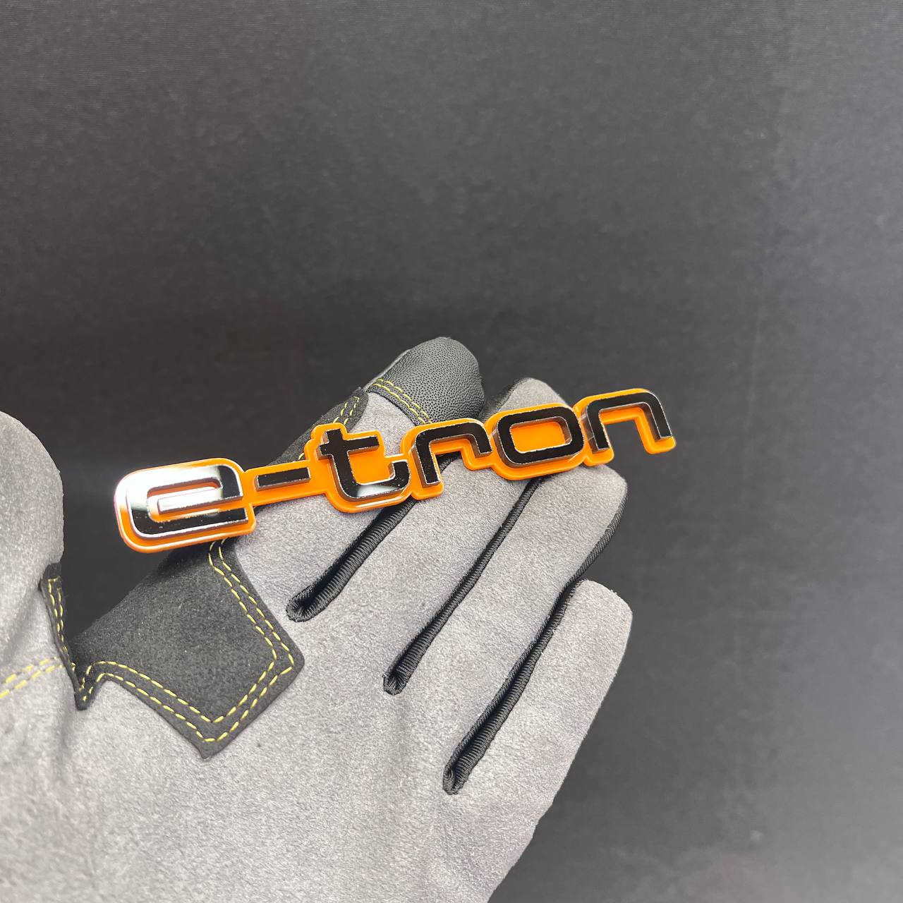 Gloss black and orange E-TRON car badge for fender or tailgate