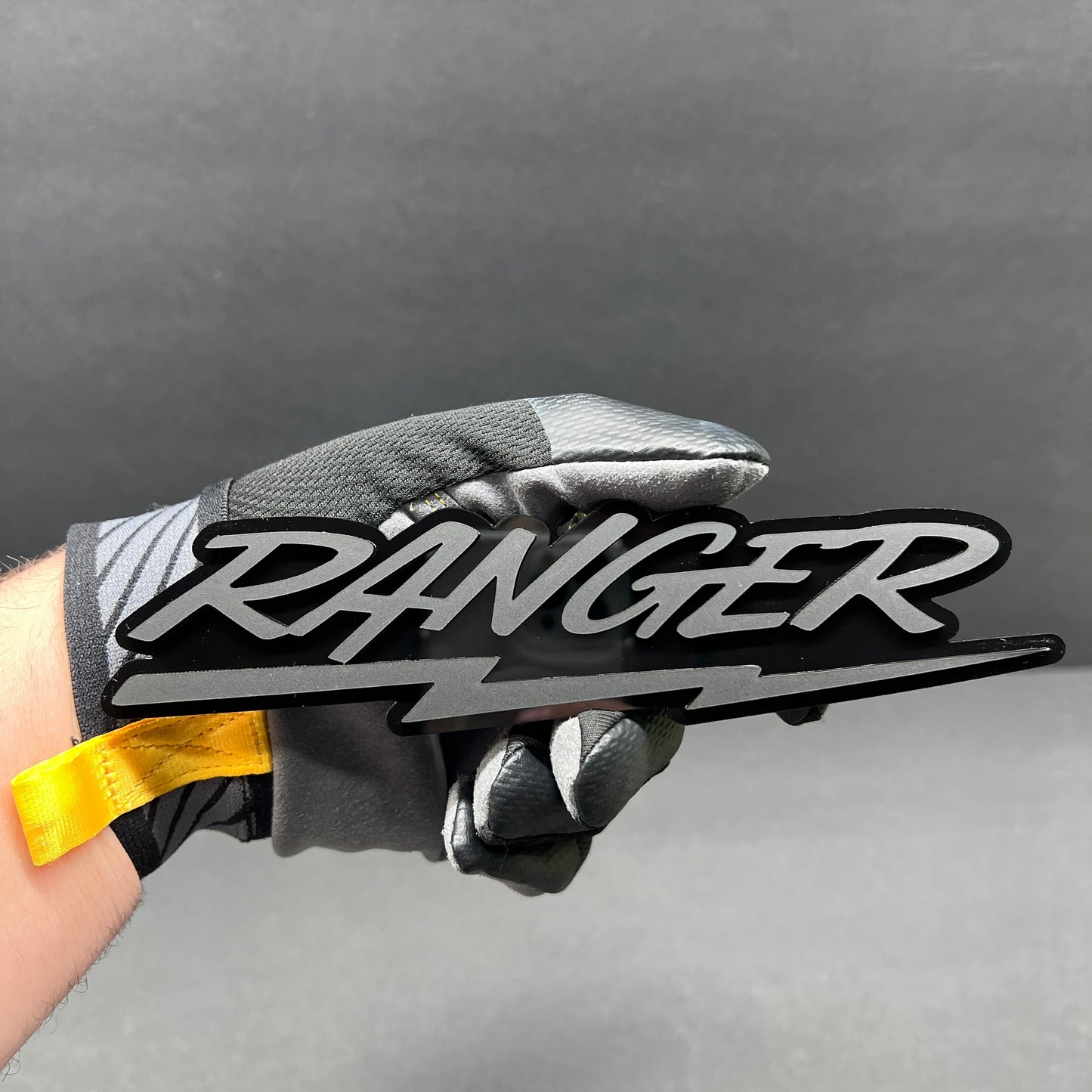 Custom lightning script automotive emblem badge in Ranger inspired font for performance truck exterior decoration