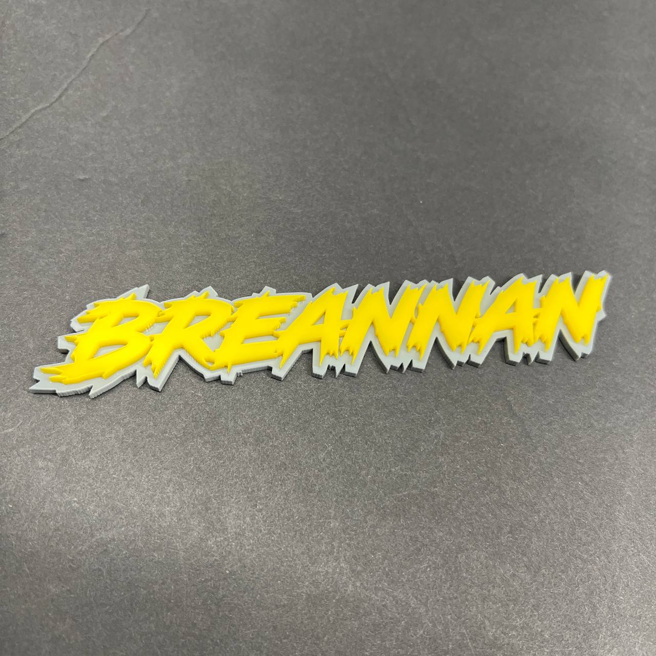 acrylic lightning font badge with gloss finish detail