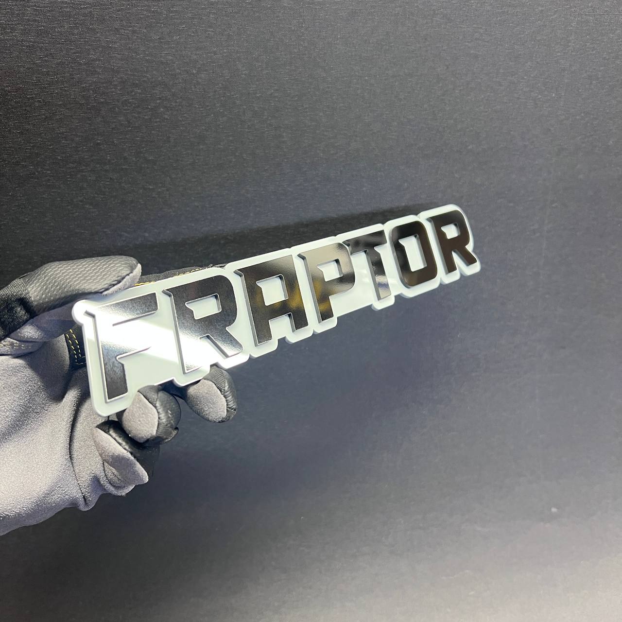 FRAPTOR 3D text car badge fender emblem for custom vehicle exterior accessories.