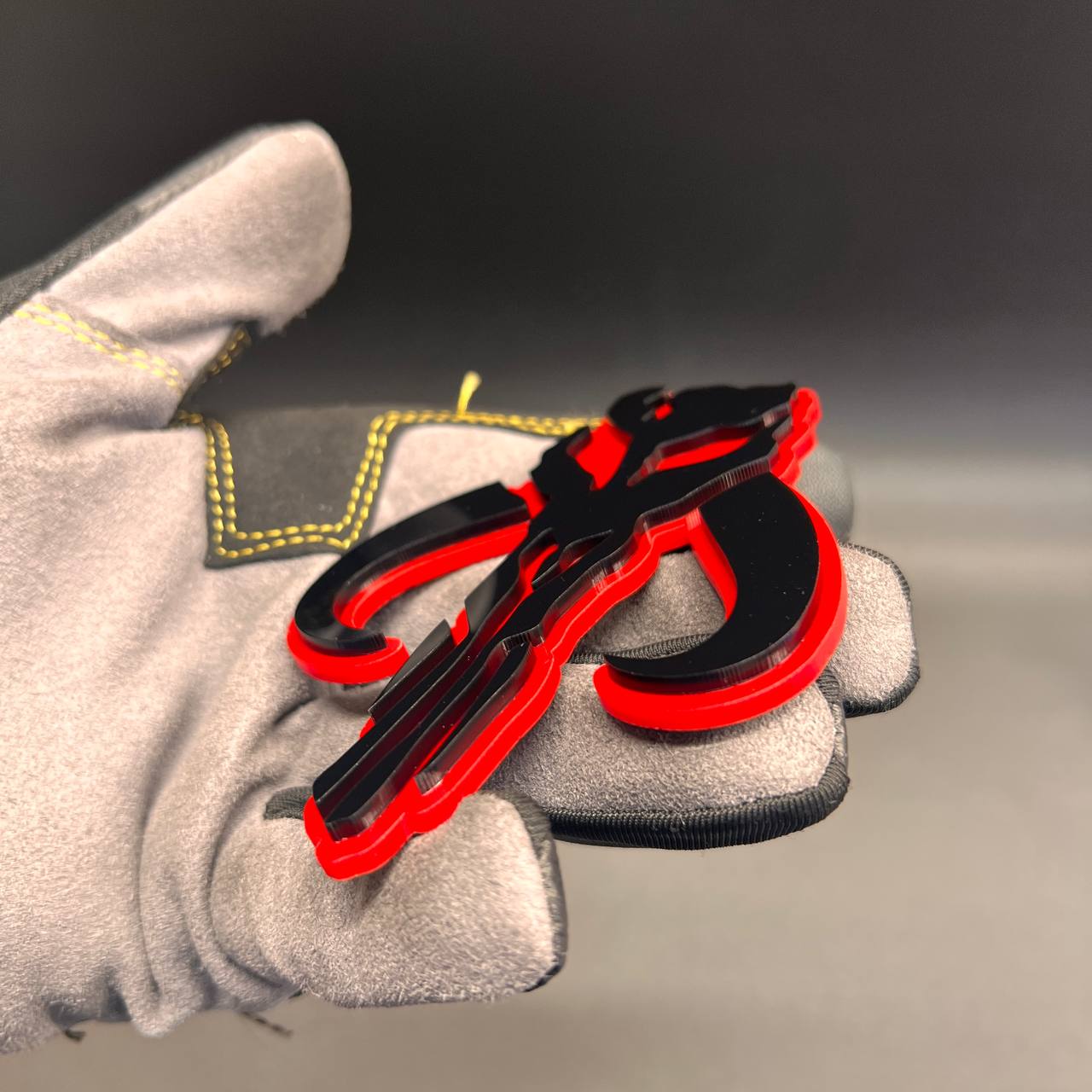 Mythosaur vehicle badge in black with bright red outline