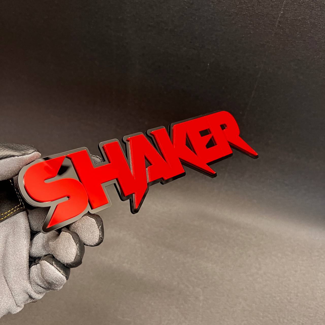 Red SHAKER custom fender badge for vehicle personalization