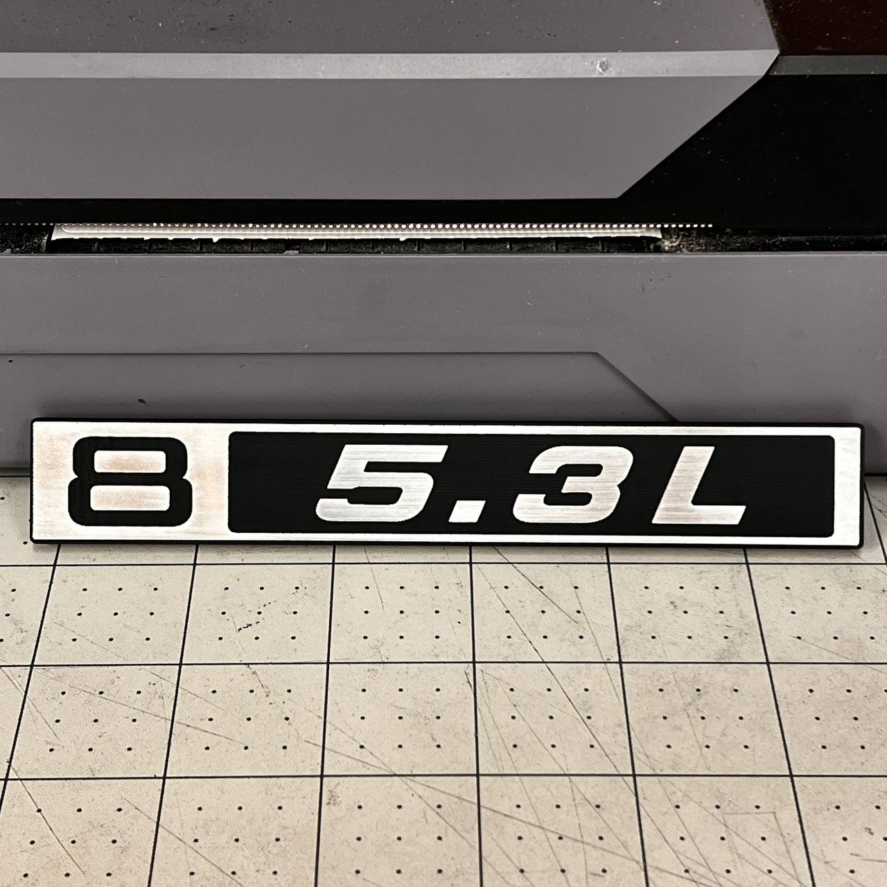 1967-1972 C10 truck 5.3L fender badge in brushed silver billet and black design.