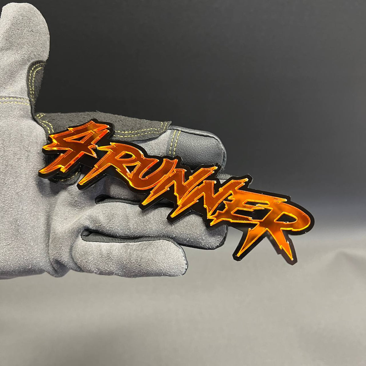 4RUNNER fender badge orange on black automotive exterior emblem