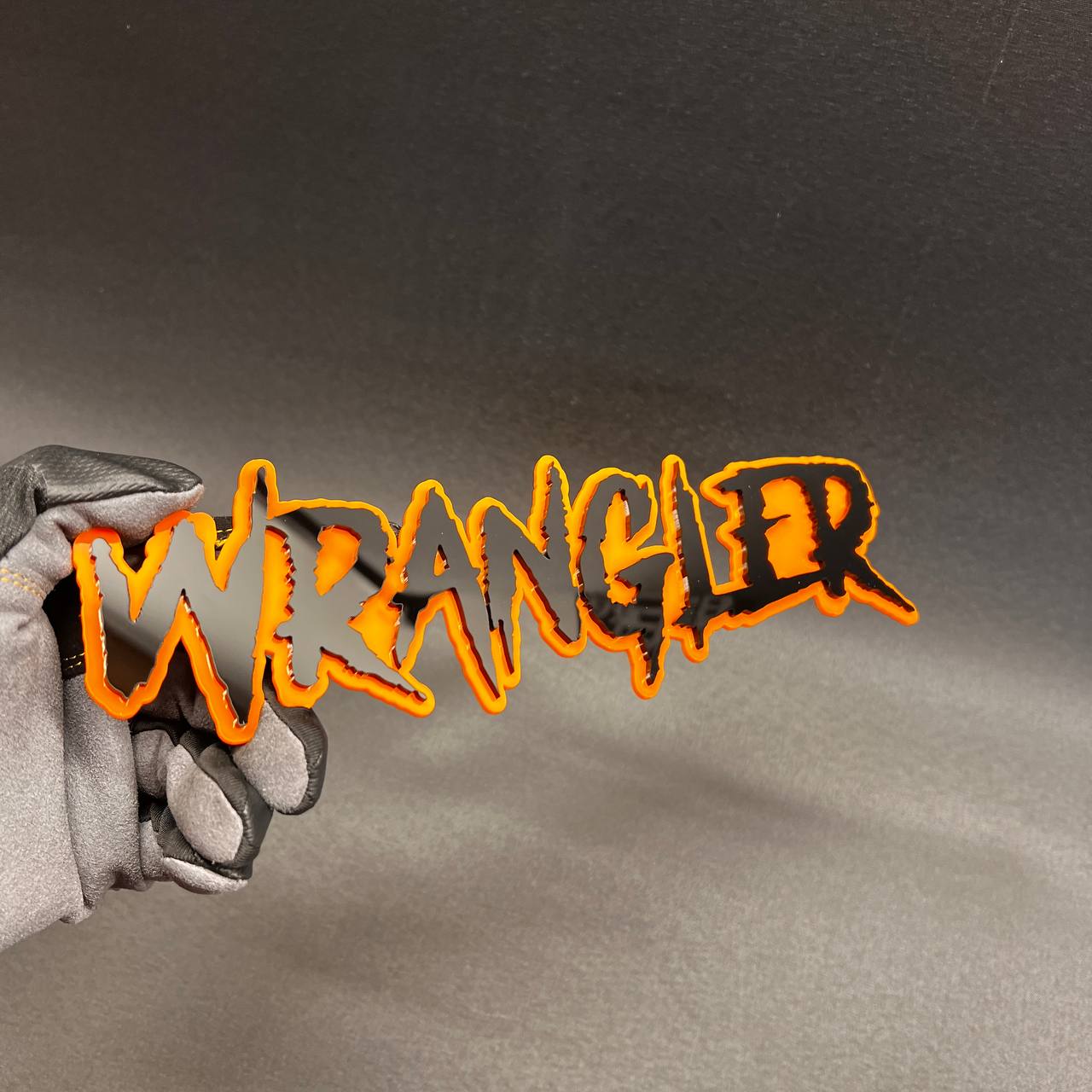 Personalized Wrangler vehicle emblem for custom car and truck builds.