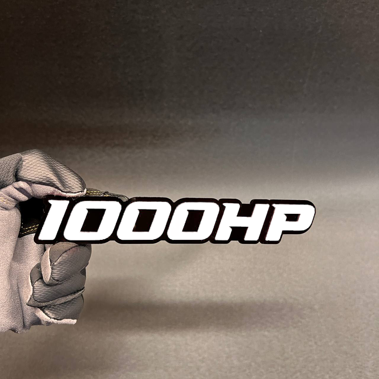 Custom 1000HP car emblem in red and black performance style