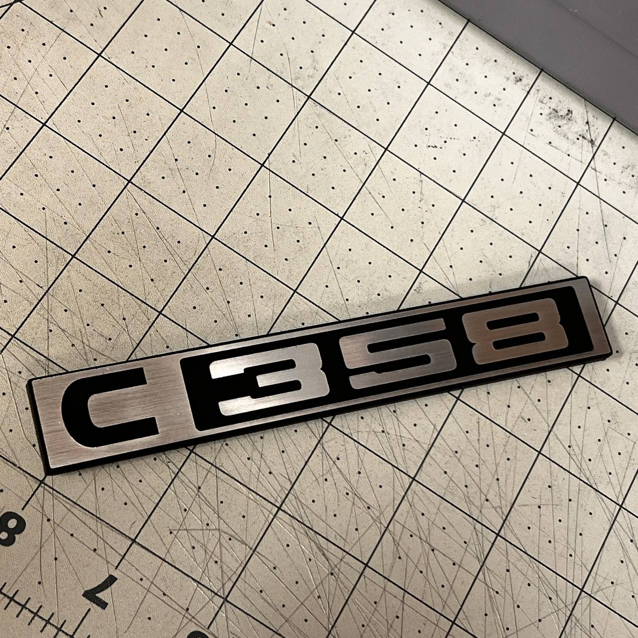 1967-1972 Chevy C10 C358 custom truck front badge with silver finish.