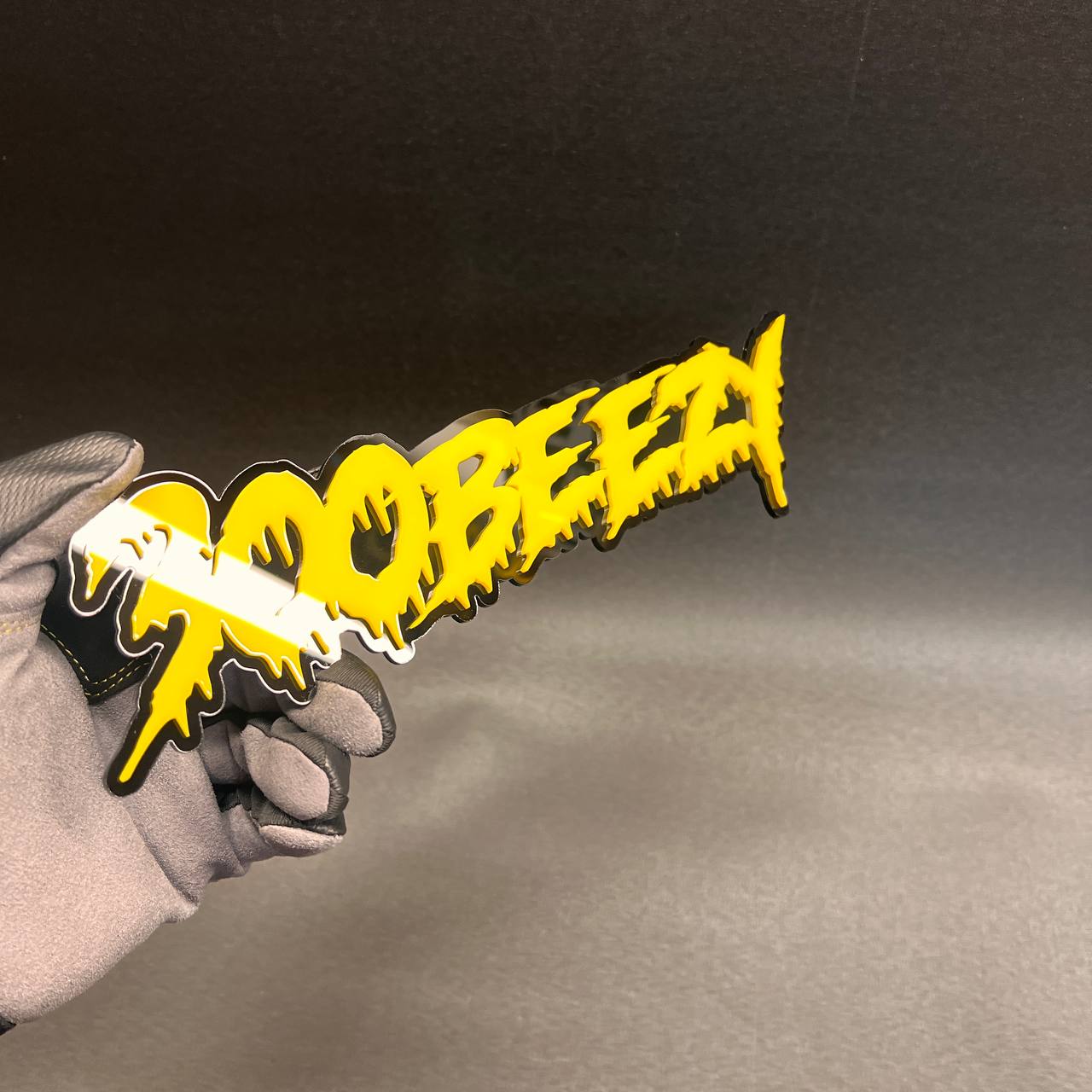 Custom 300 Beezy vehicle emblem featuring bold graffiti drip lettering.