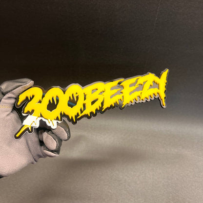 Custom 300 Beezy text car badge made from layered acrylic with 3M adhesive backing.