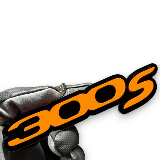 Handmade custom 300S automotive badge close-up