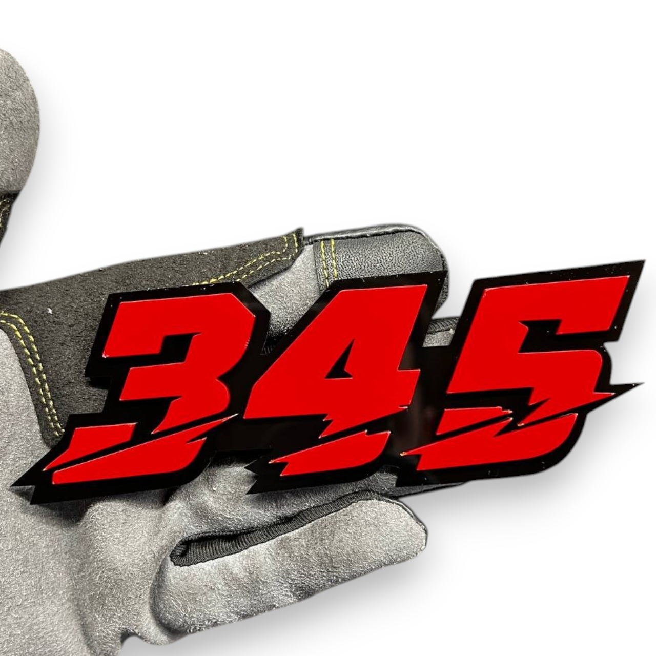 345 badge installed on Ford F150 grille custom emblem