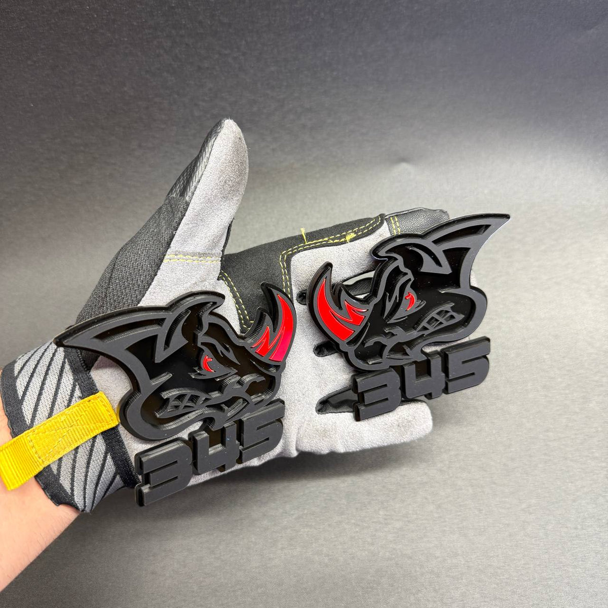 Dodge Challenger inspired 345 Rhino fender badge featuring a black aggressive rhino design with contrasting red horn and eye details.