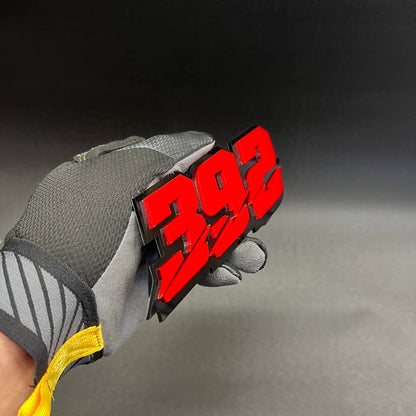392 badge shown as custom vehicle fender emblem with bold number design