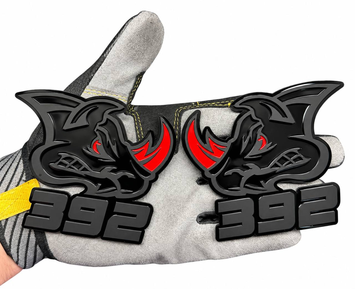 392 Rhino car badge featuring aggressive rhinoceros head design, black layered acrylic, red horns and eyes, and bold 392 lettering for Dodge muscle car styling.