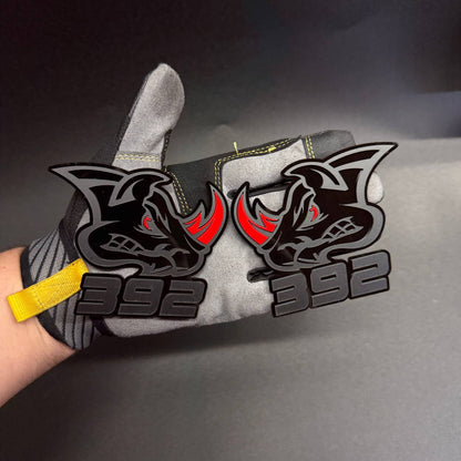 Custom Dodge Charger 392 Rhino fender emblem with black rhinoceros face, red horn accents and bold 392 numbers, inspired by HEMI V8 performance.