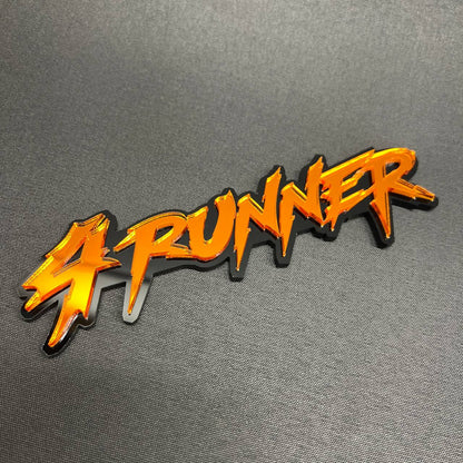 Orange 4RUNNER car badge emblem with black backing for Toyota SUV exterior