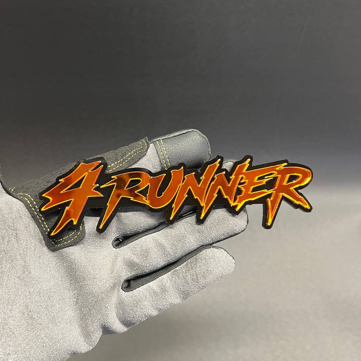 4RUNNER orange and black car badge fender emblem with custom automotive styling
