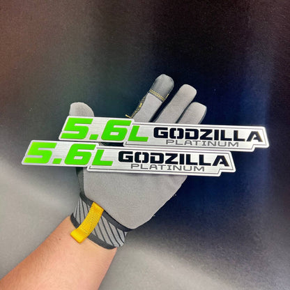 5.6-liter Godzilla Platinum performance badge with black engraved-style lettering