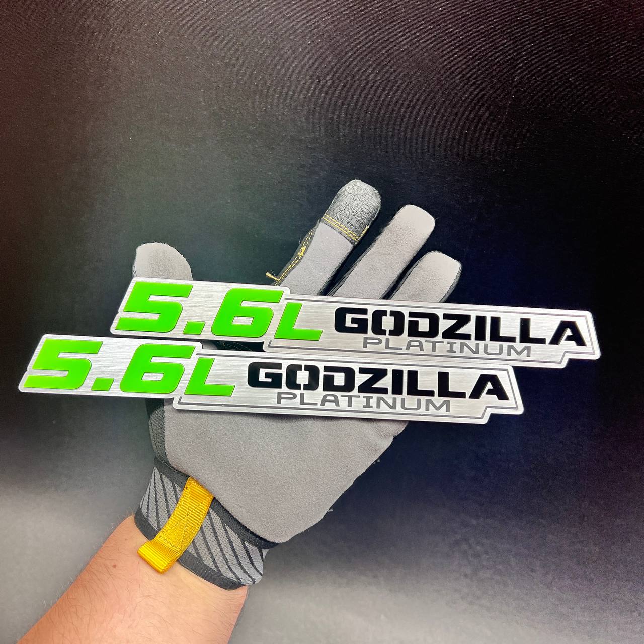 5.6-liter Godzilla Platinum performance badge with black engraved-style lettering