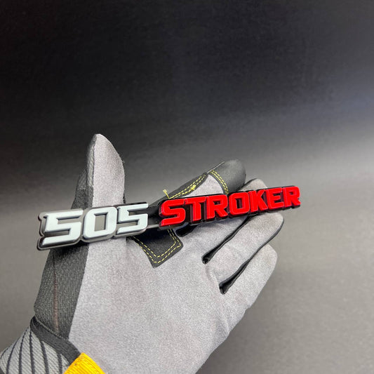 Custom 505 STROKER car badge in red and white with black outline for muscle car fender.