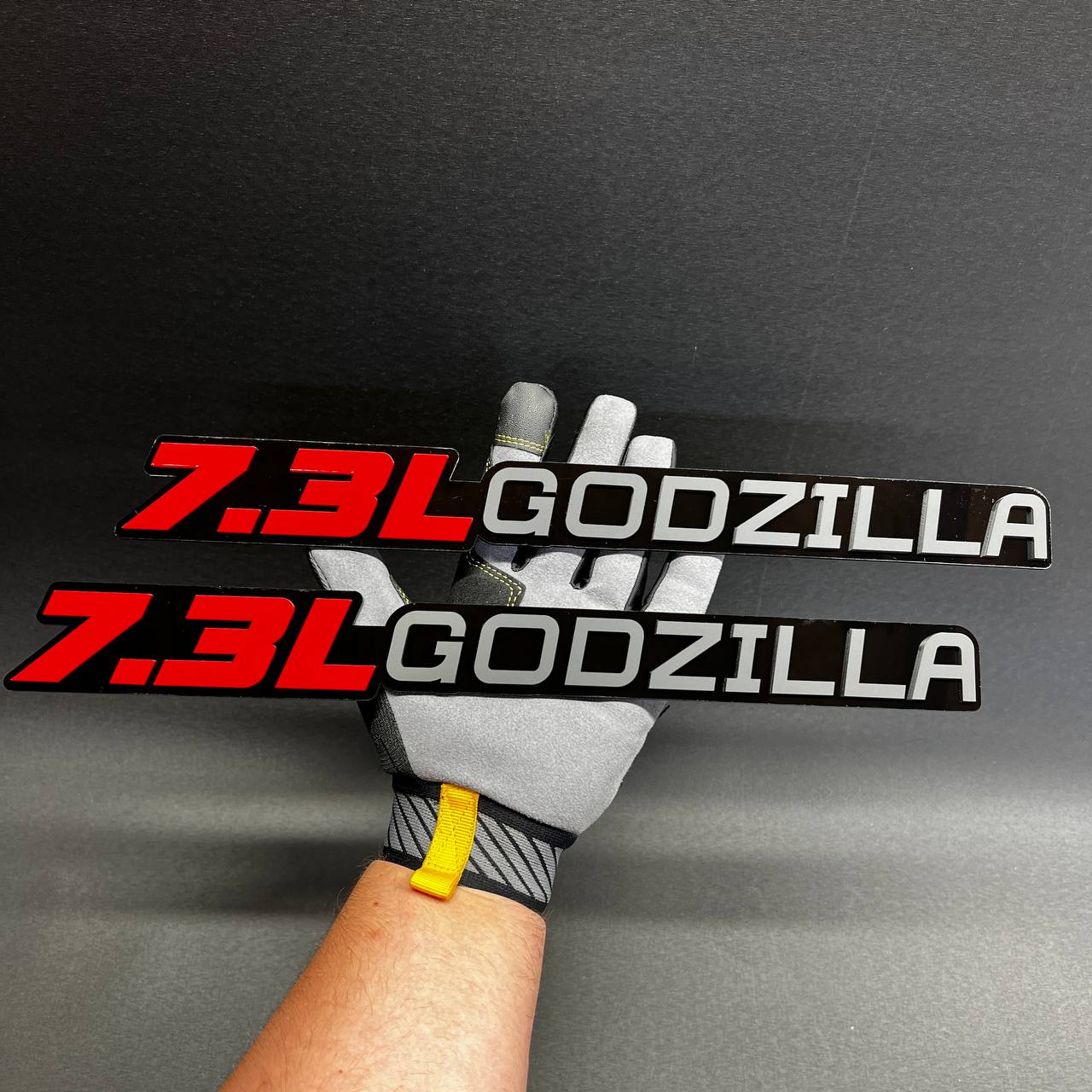 Matte black 7.3L Godzilla car badge fender emblem for Ford truck styling.