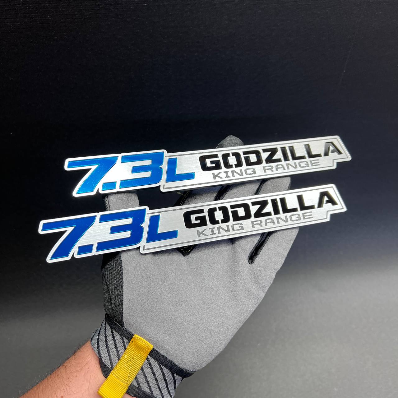 Custom automotive badge with 7.3L lettering and Godzilla King Range design