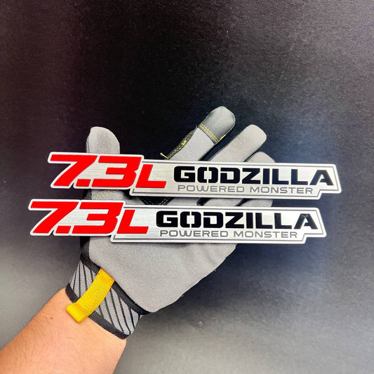Pair of 7.3L Godzilla Powered Monster car badges in red, black and brushed silver
