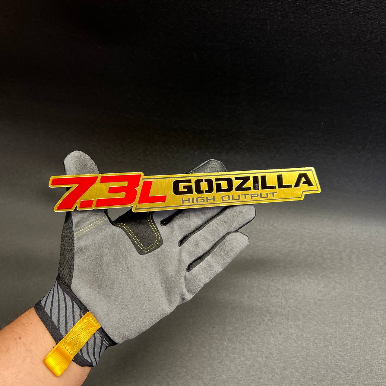 7.3L Godzilla engine badge installed on Ford F250 side fender custom emblem