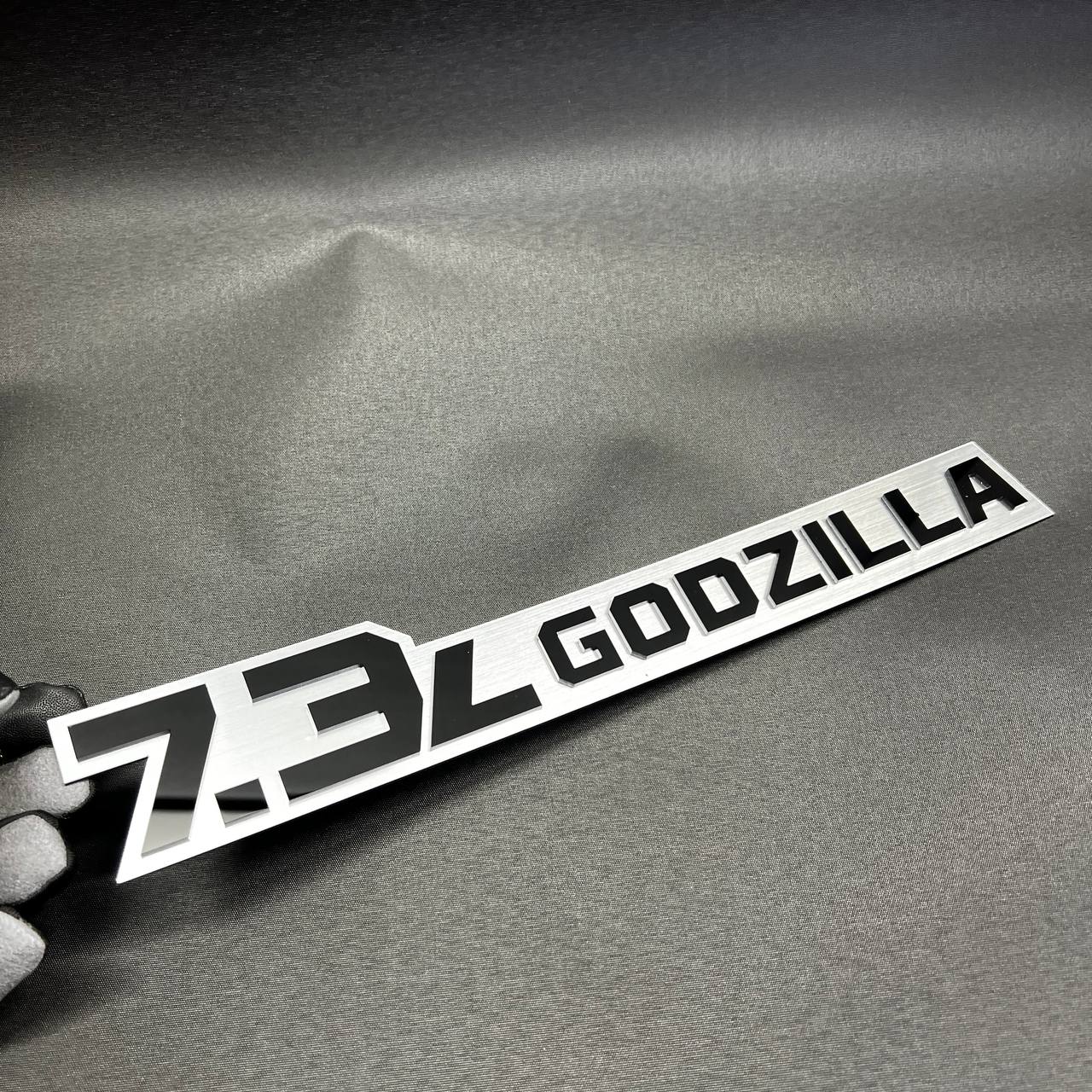 Custom 7.3L Godzilla tailgate emblem for F250 and F350 truck appearance upgrade.