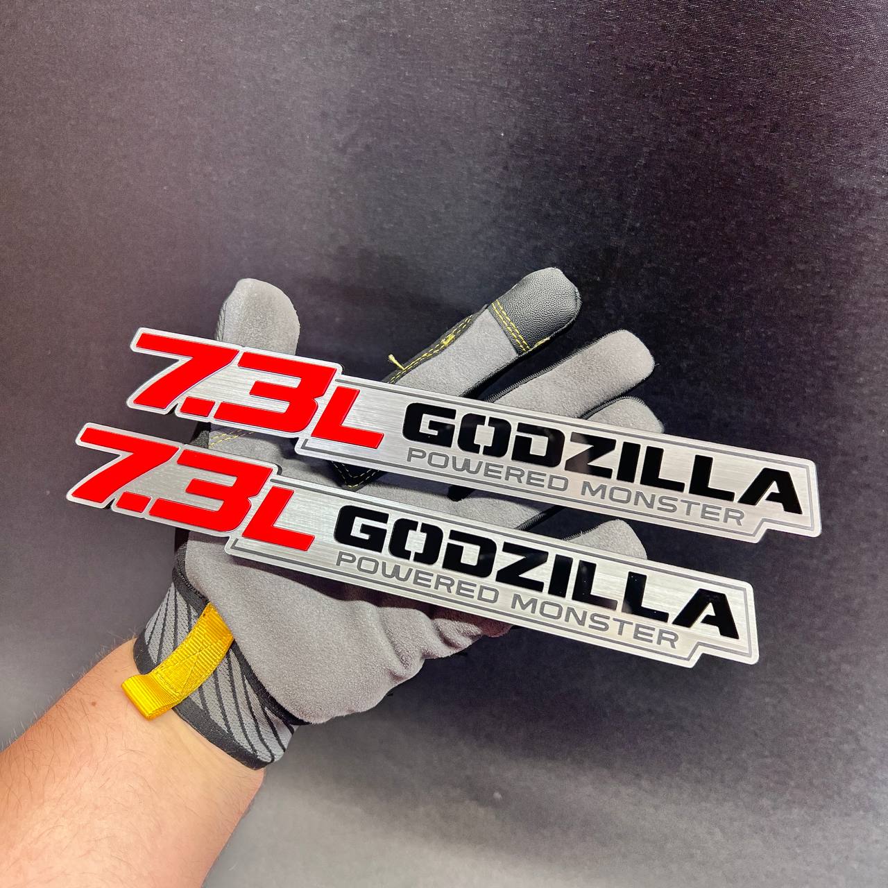 Set of two 7.3L Godzilla Powered Monster fender emblems for automotive use
