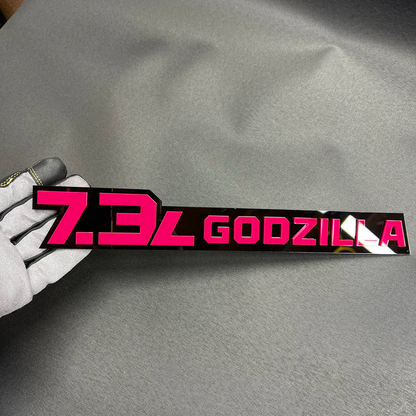 7.3L Godzilla V8 acrylic car badge designed for Ford Super Duty exterior styling.