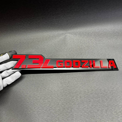 Long 7.3L Godzilla acrylic fender emblem for Ford Super Duty trucks with bold custom V8 styling.