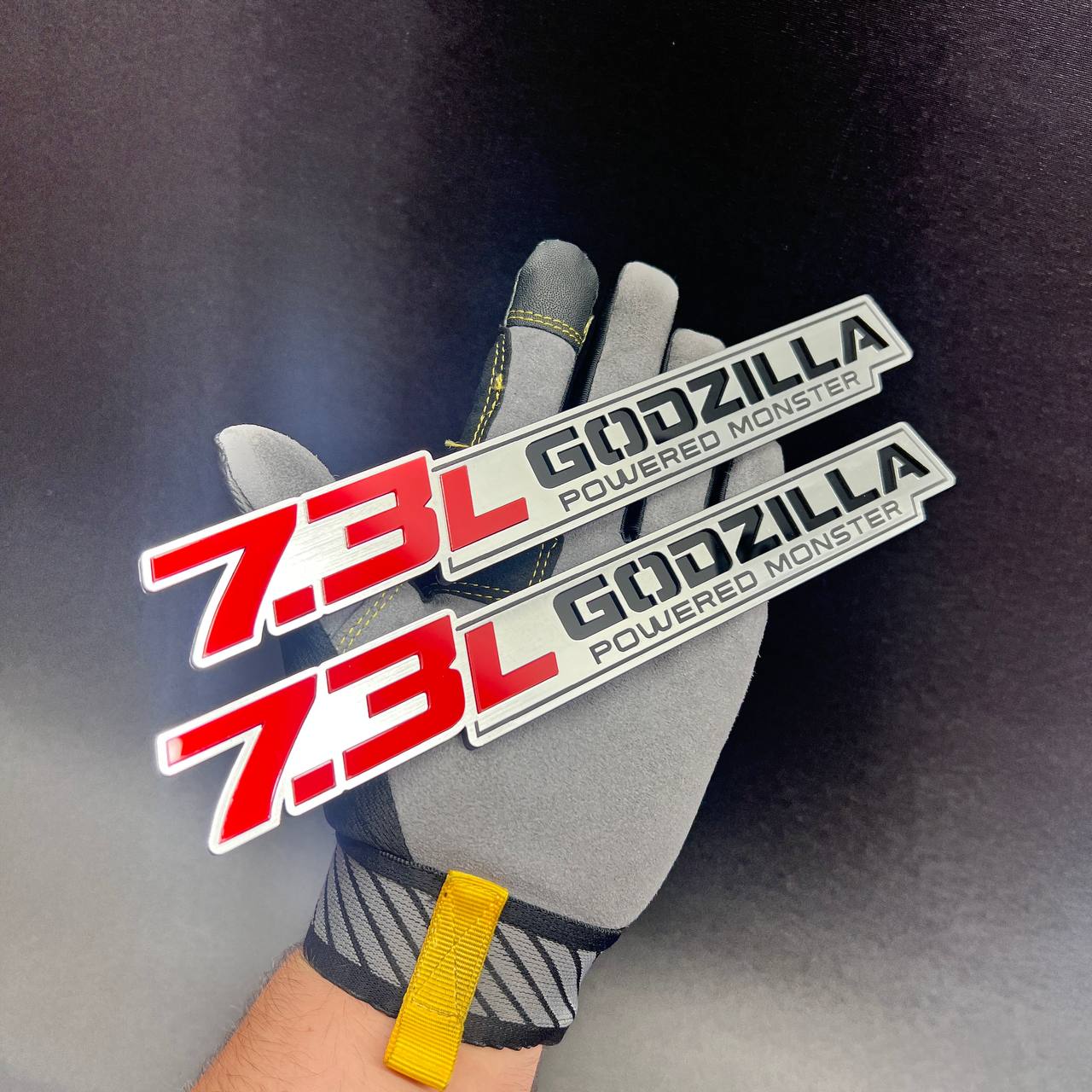 Layered 7.3L Godzilla Powered Monster exterior badges for truck styling
