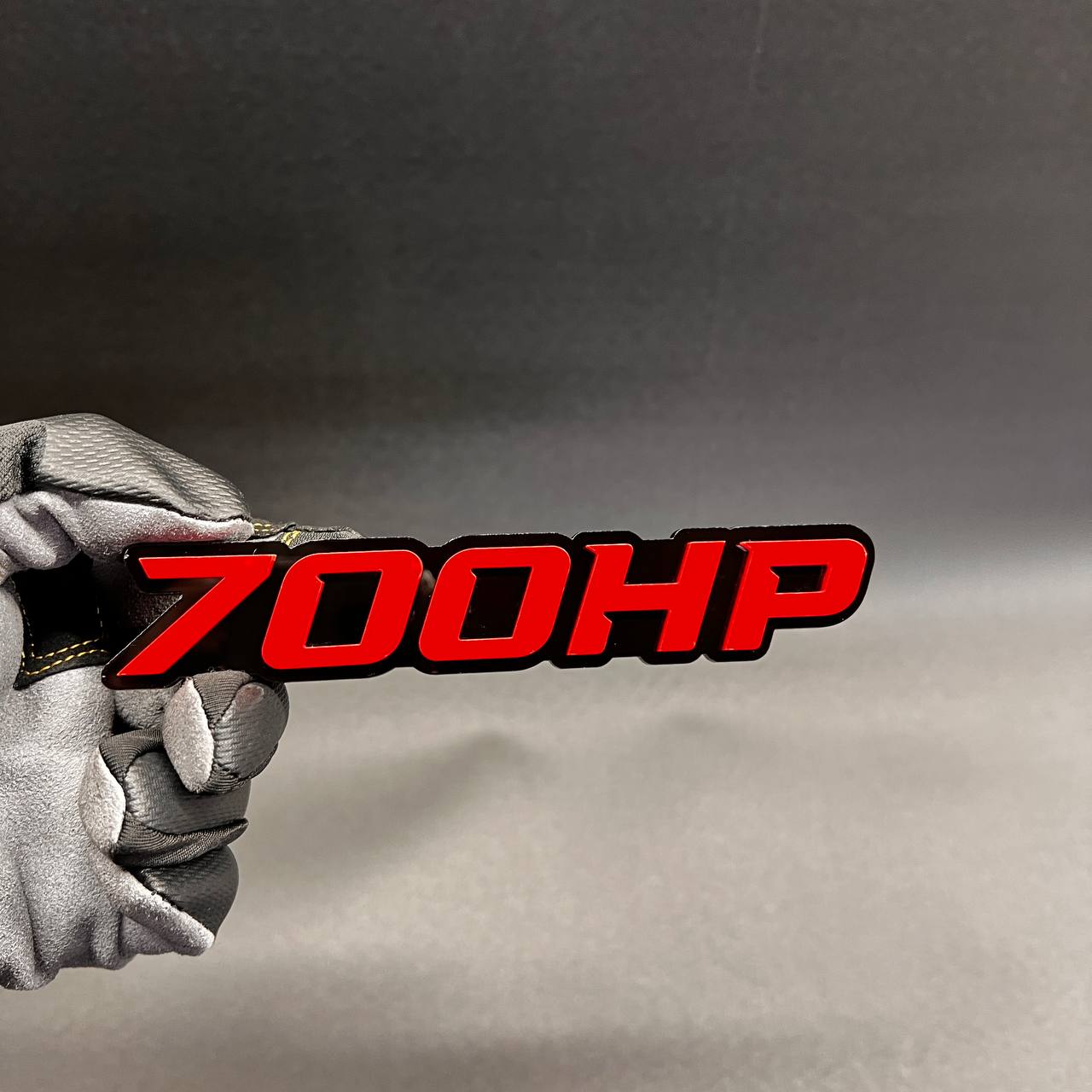 700HP car badge fender emblem with red lettering on black base