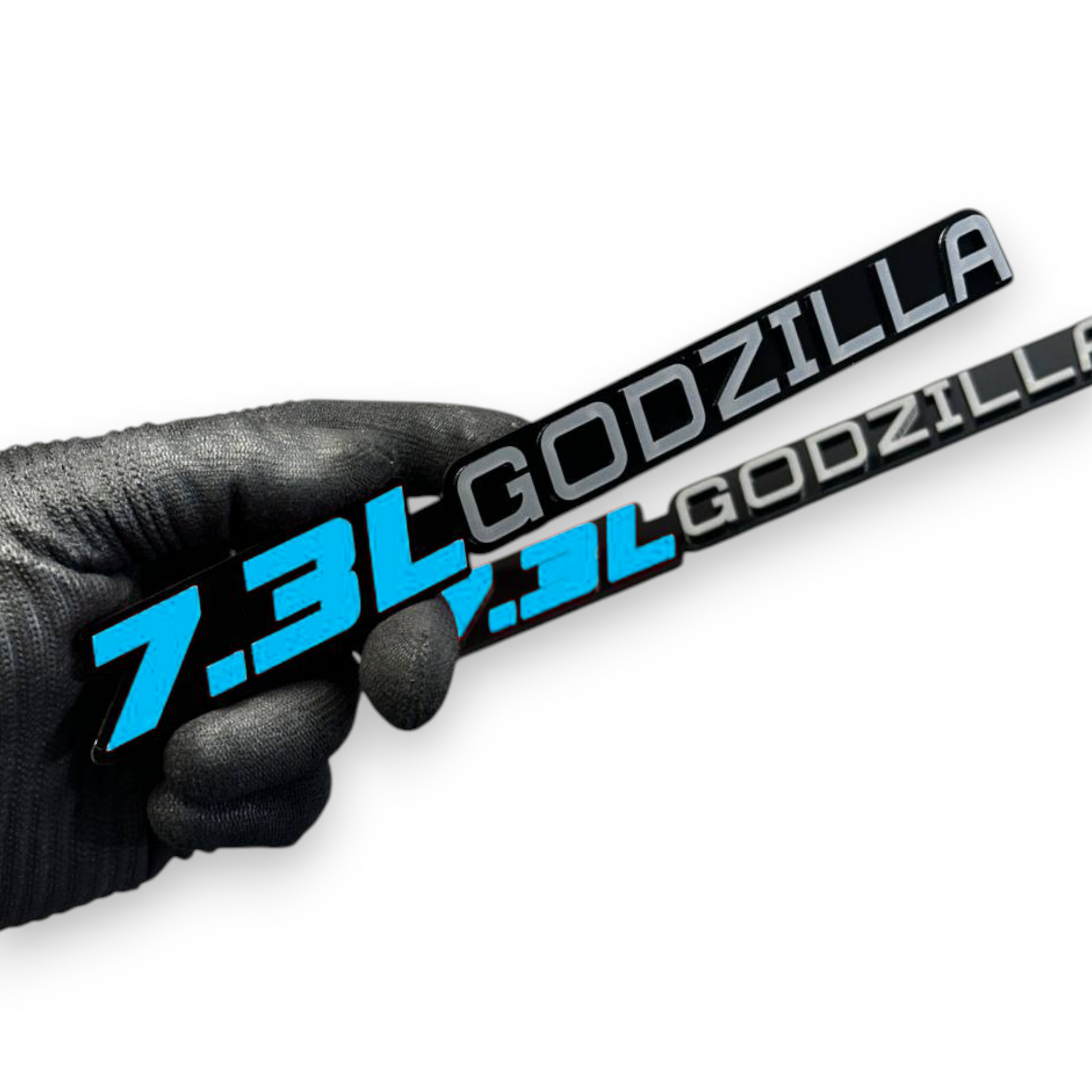 Custom 7.3 truck badge with aggressive dinosaur design