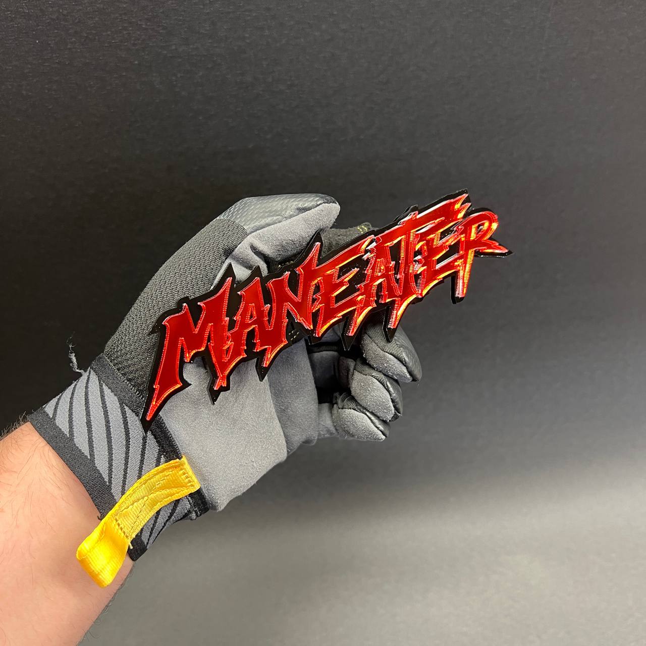 Premium acrylic MANEATER custom text badge with layered automotive design
