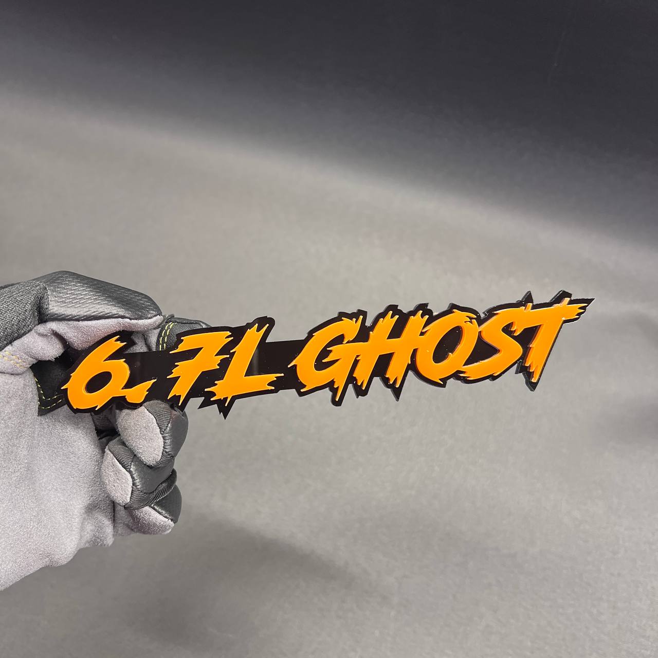 Custom 6.7L GHOST text car badge with bold aggressive design and 3M adhesive backing