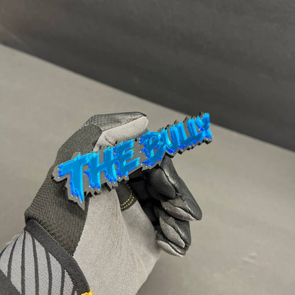 The Bully blue mirror acrylic text badge on Ford F150 truck fender