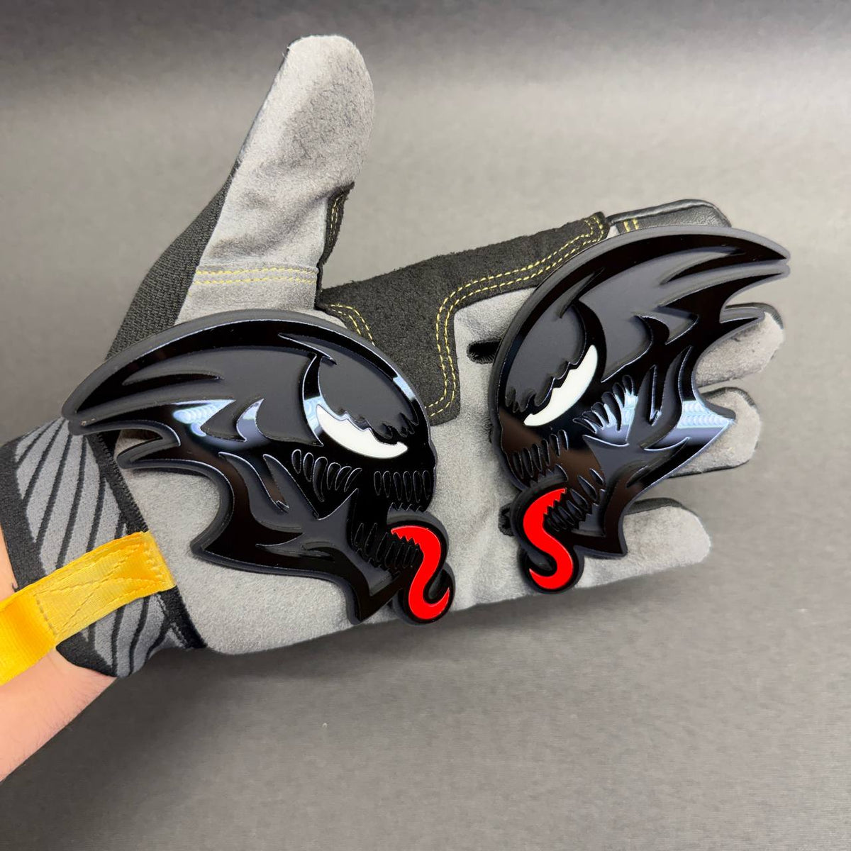 Unique ALIEN-inspired car badge featuring a futuristic creature head, designed for custom vehicle builds, muscle cars, pickup trucks and automotive enthusiasts.