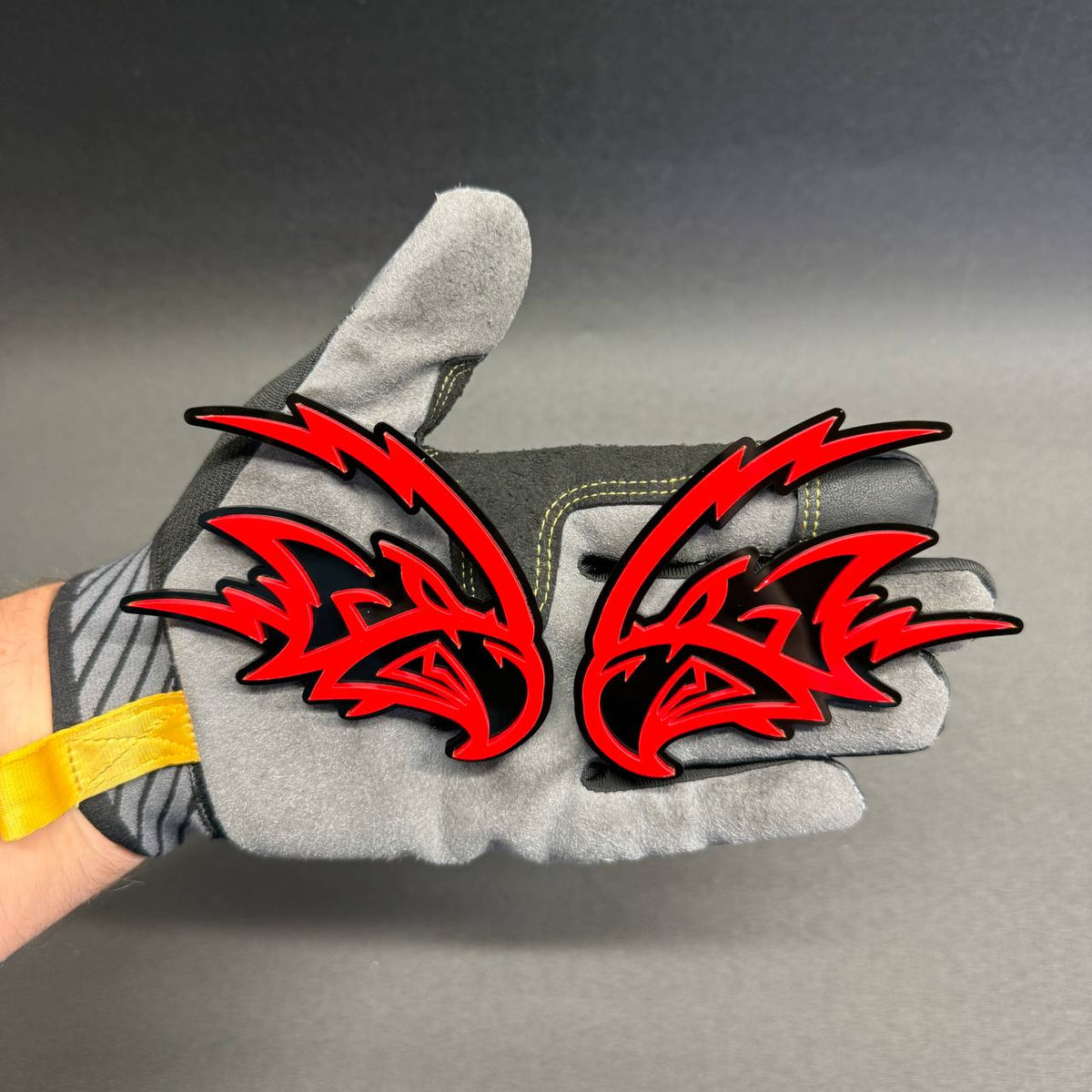 Angry Falcon red and black car badge emblems with aggressive bird design for custom cars, trucks, SUVs and muscle car styling