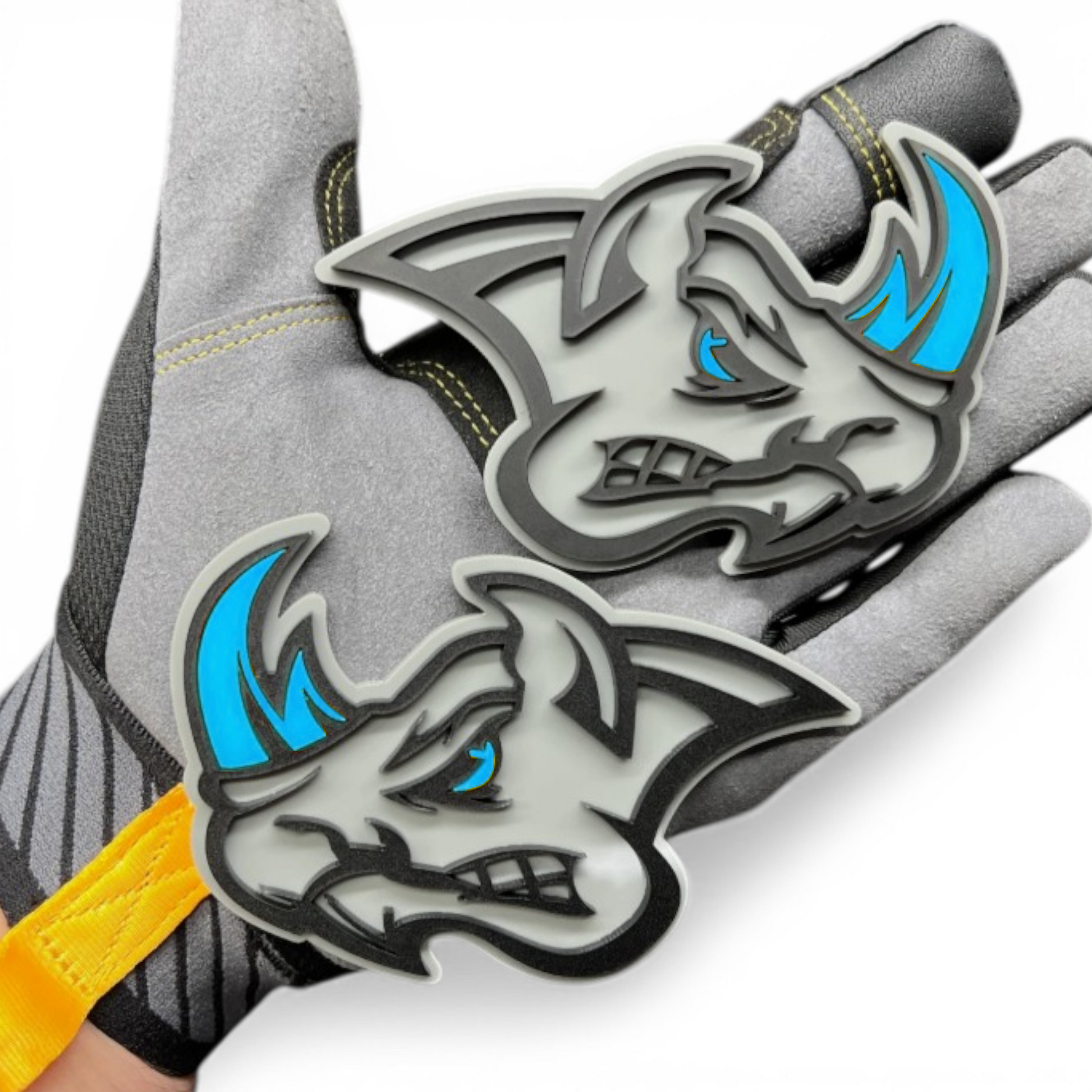 Rhino head badge pair shown as custom vehicle fender emblem for automotive use