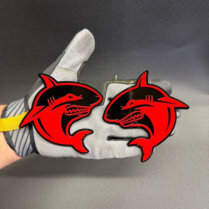 Set of two Angry Shark truck badges with aggressive red and black shark emblem design
