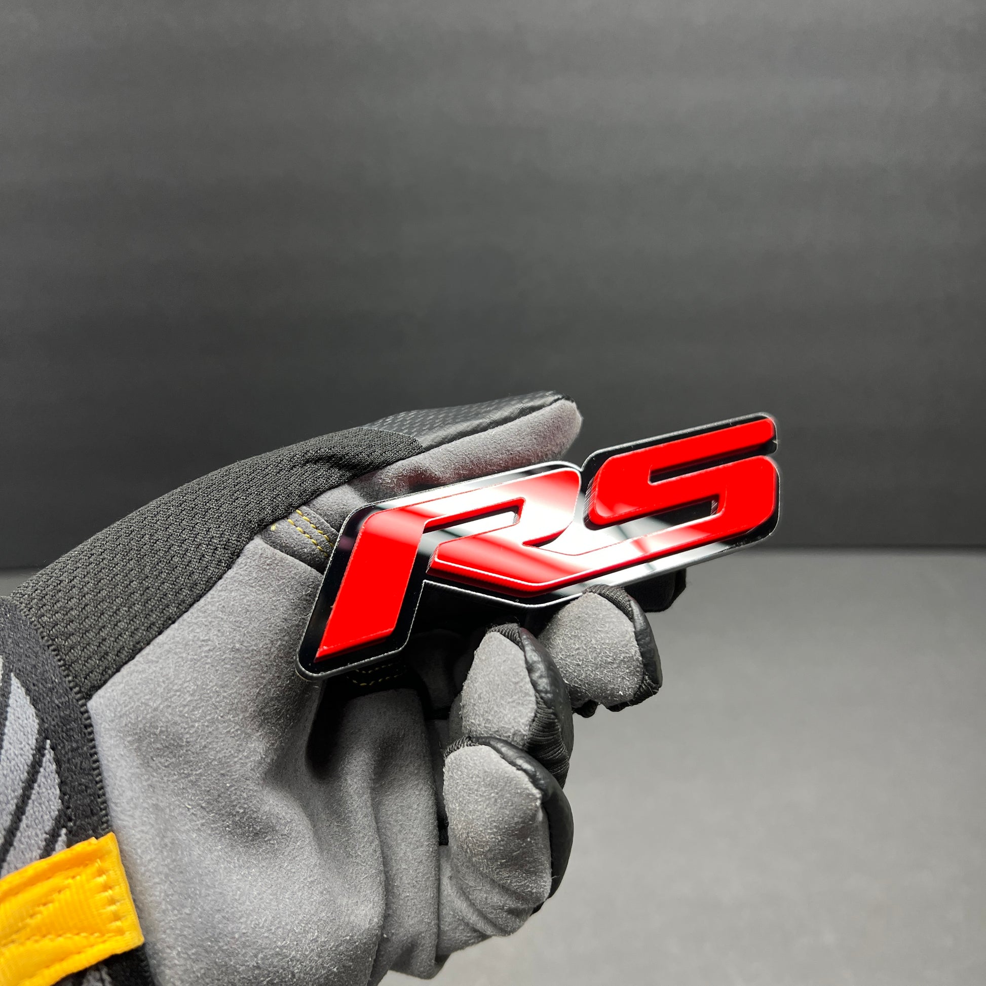 Red and black RS badge compatible with Audi RS Q8 styling.