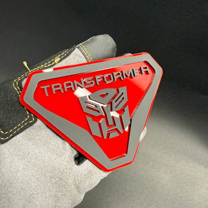 Custom Transformers Autobot shield car emblem with layered acrylic construction for personalized fender and tailgate decoration.