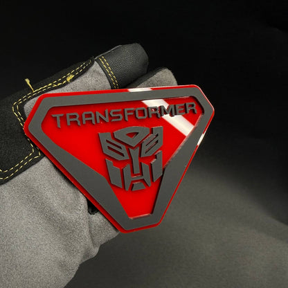 Autobot Badlands 4x4 car badge featuring a Transformers-inspired design for off-road trucks, SUVs and custom vehicles.