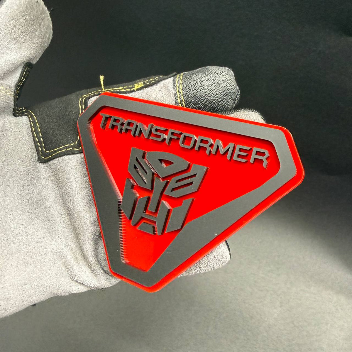 Autobot Transformer Badlands badge featuring a geometric shield design for Ford Bronco Badlands exterior customization.